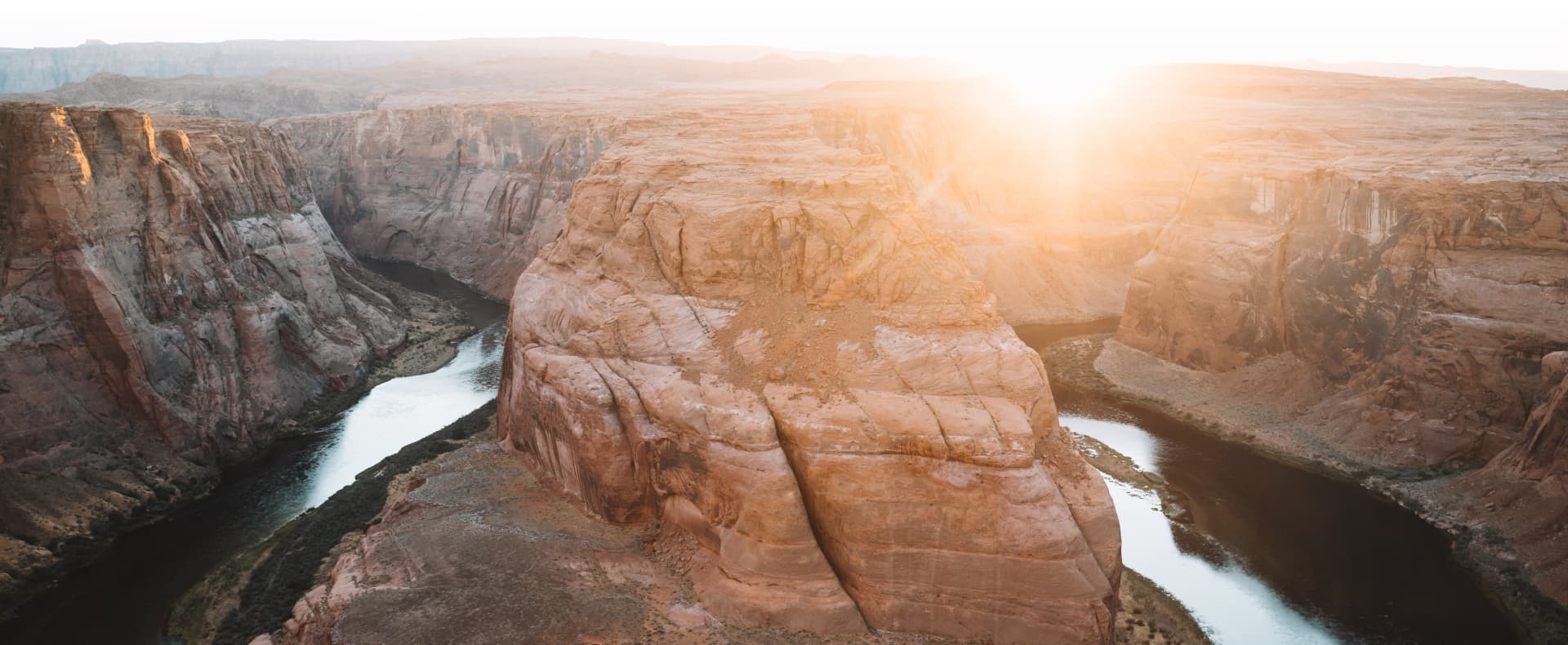 Sunrise over a vast desert canyon