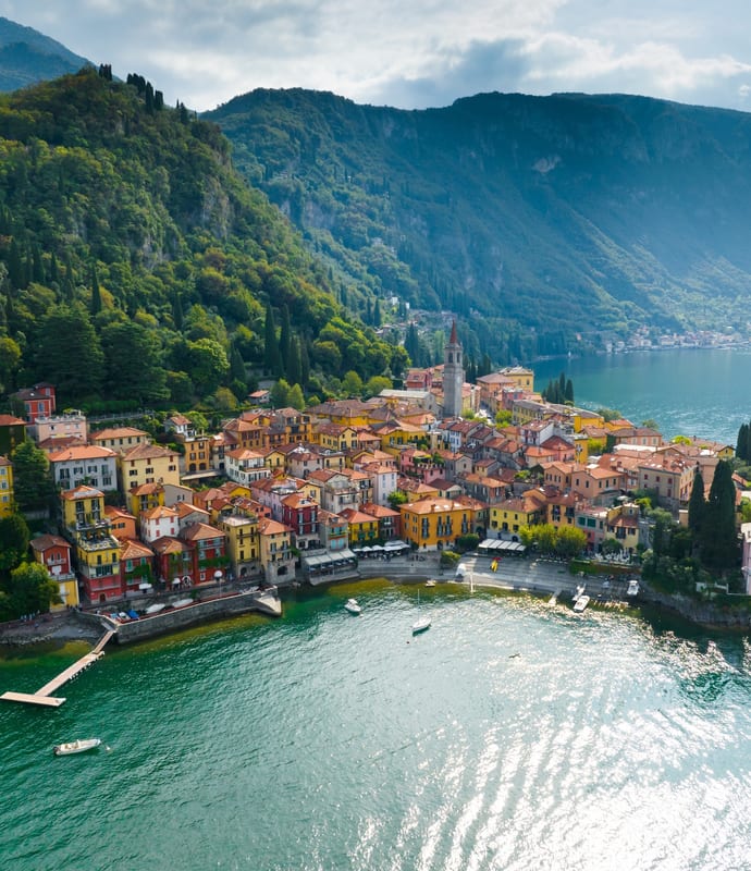 Aerial view of colourful buildings by the coast, Lake Como